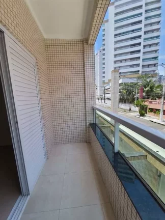 Imagem Casa com 2 dormitórios à venda, 70 m² por R$ 398.000 - Caiçara - Praia Grande/SP