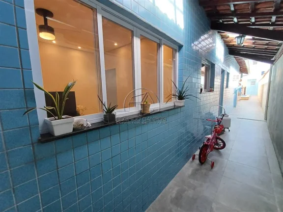 Imagem Espaçosa Casa Geminada no Mirim Praia Grande – 2 Quartos e Piscina