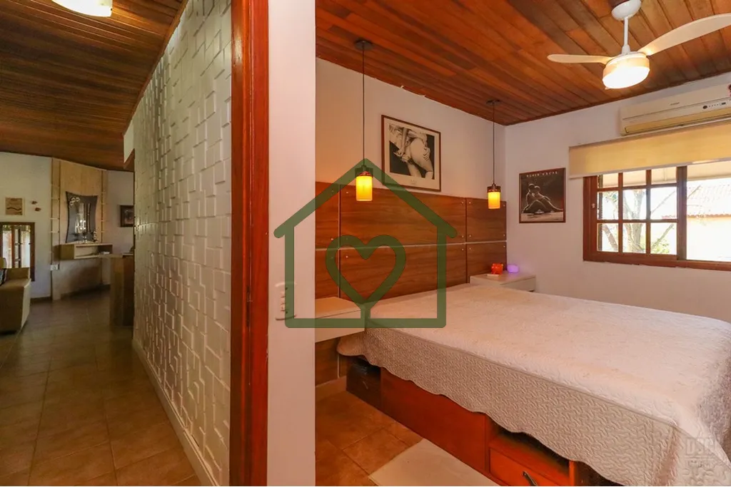 Imagem Casa à venda no bairro Hípica com 165 m2 de área privativa em terreno de 492 m2. O imóvel conta ...