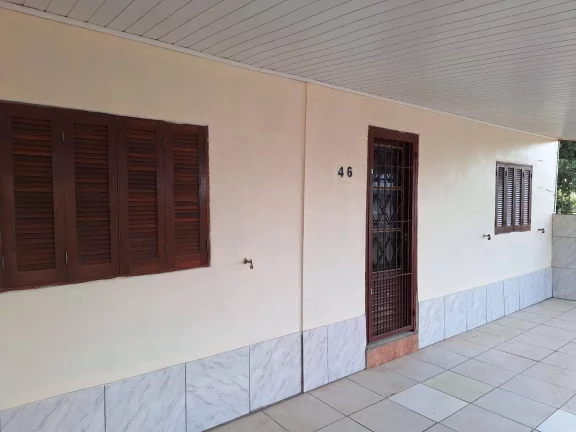 Imagem Casa com 91m², dois dormitórios, garagem, Lomba Tarumã, Viamão/RS.
