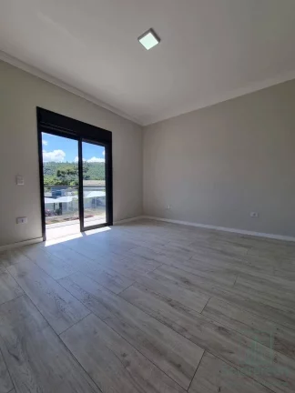 Imagem Casa 3 suítes e 4 vagas garagem, piscina , Condomínio Terras de Atibaia 1