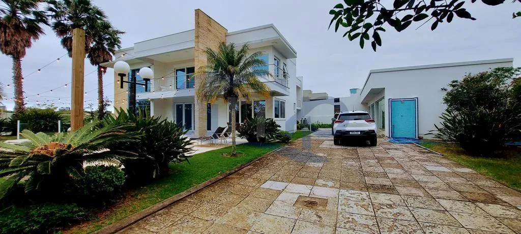 Imagem Casa a venda com 4 dormitorios no Igra Norte em Torres/RS