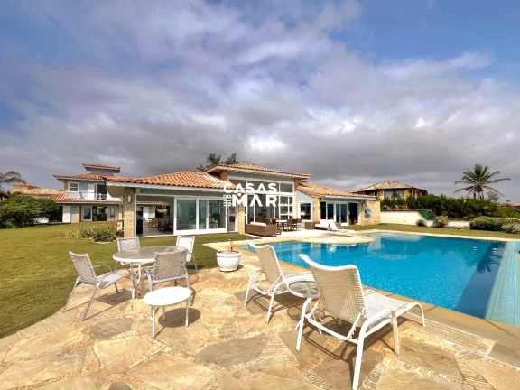 Imagem Residência de luxo à beira-mar em condomínio exclusivo na Praia Rasa, Armação dos Búzios-RJ: 3 suítes, 3 salas, 6 vagas.