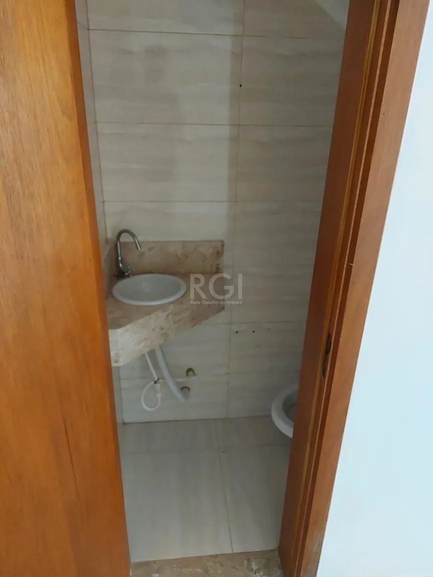 Imagem Casa para Venda - 107.34m², 2 dormitórios, sendo 1 suites, 1 vaga - Aberta dos Morros, Porto Alegre