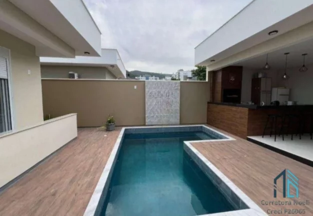 Imagem Casa térrea a venda, Semi mobiliada, 03 quartos c/suíte espaço gourmet, Pedra Branca em Palhoça SC