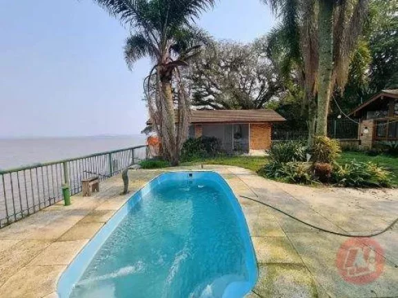 Imagem Casa com 3 dormitórios para alugar, 500 m² por R$ 19.884,00/mês - Pedra Redonda - Porto Alegre/RS