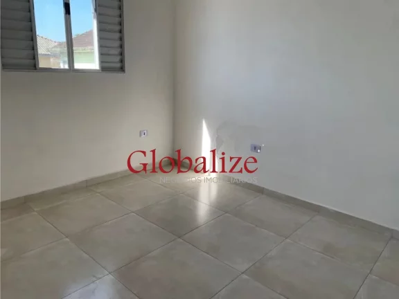 Imagem Casa sobreposta alta à venda com 72m², 2 quartos, 1 suíte, churrasqueira por R$315.000,00 em Santos