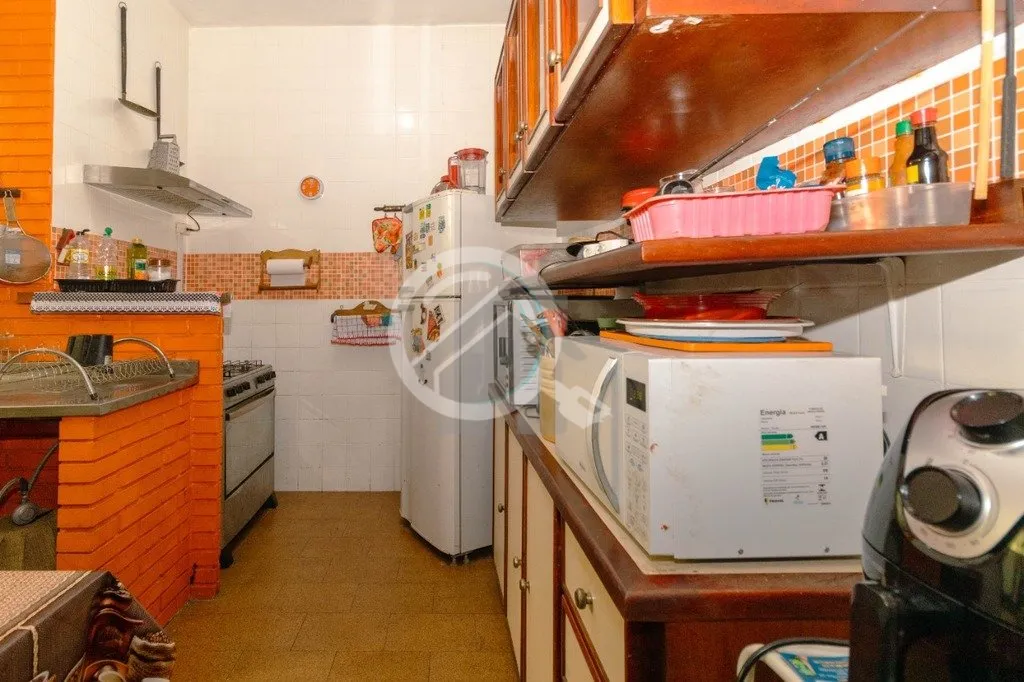 Imagem Casa 2 pavimentos com 130m² de área privativa, três dormitórios, living dois ambientes, sala de ...