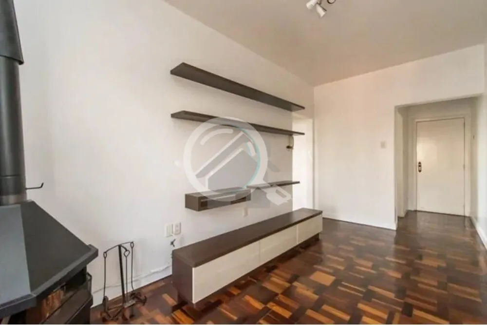 Imagem Ótimo apartamento de frente com sacada, sala com lareira e ar condicionado, dormitório com móveis...