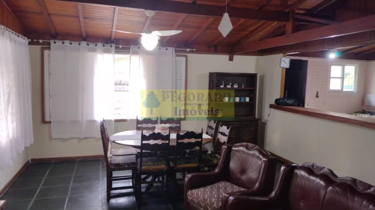 Imagem Imperdível Casa de 4 Quartos na Prainha, Caraguatatuba-SP: 2 Suítes, 2 Salas, 4 Banheiros, 4 Vagas de Garagem!