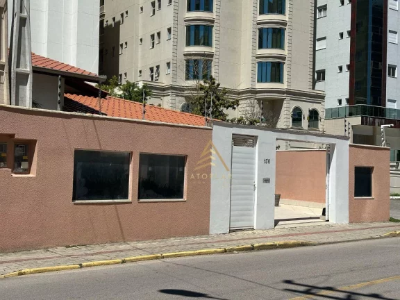 Foto do imóvel Casa com 3 dormitórios para alugar, 127 m² por R$ 7.657,95/mês - Centro - Itapema/SC