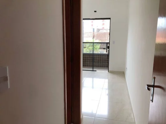 Imagem Sobrado com 2 dormitórios à venda, 60 m² por R$ 390.000,00 - Caiçara - Praia Grande/SP