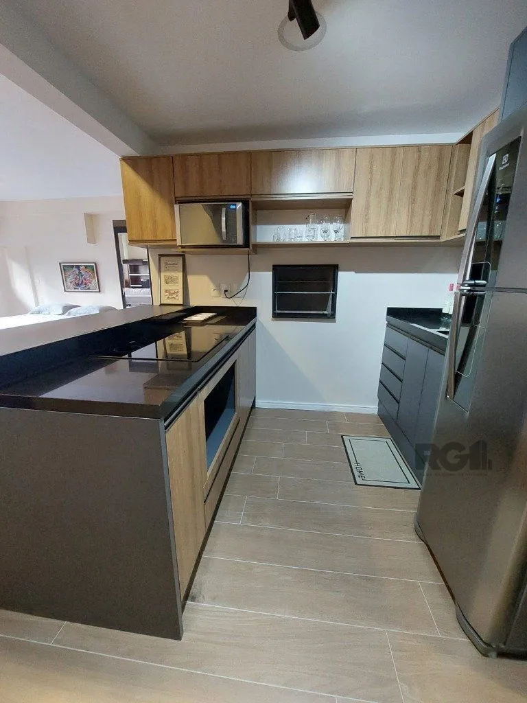 Imagem Apartamento stidio com 1 dormitório, 1 vaga de garagem no Bairro Auxiliadora.
