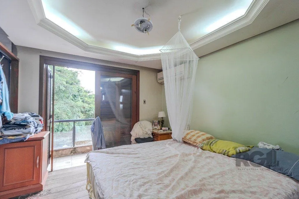 Imagem Casa 400m² - 5 dormitórios, 4 vagas no bairro Vila Jardim