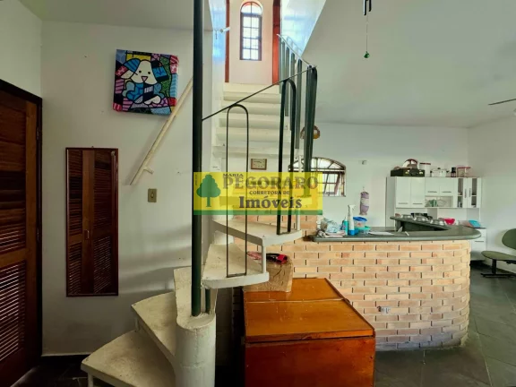 Imagem Casa à venda em Caraguatatuba Martim de Sá 3 quartos, 3 suítes, 1 sala, 3 banheiros, 10 vagas de garagem. 166m² de área.