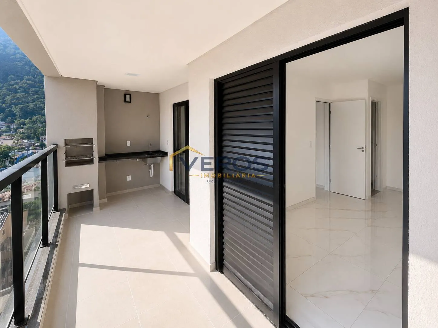 Imagem Apartamento novo a venda perto do centro de Caraguá com churrasqueira