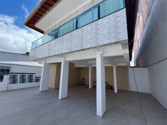 Imagem Casa com 2 dormitórios à venda, 51 m² por R$ 245.000 - Caiçara - Praia Grande/SP