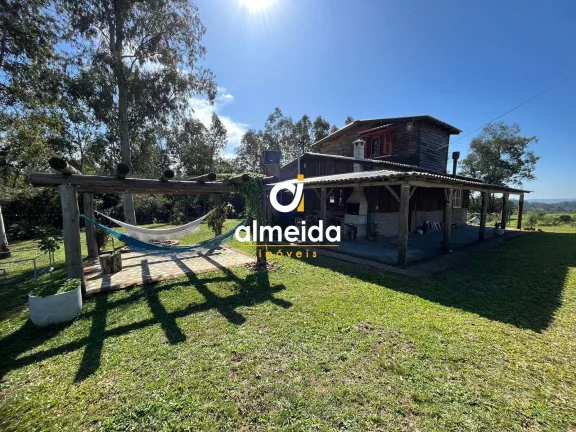 Imagem Chácara 3 dormitórios à venda Zona Rural Butiá/RS