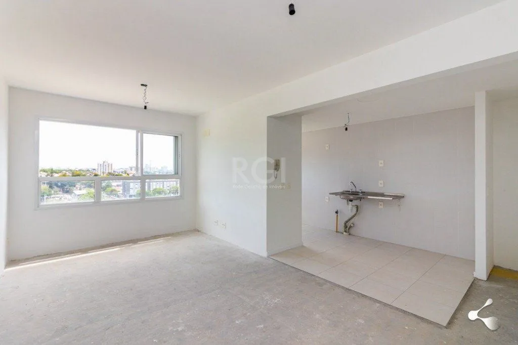 Imagem vende 03 dormitórios, living para dois ambientes, banheiro social, cozinha com churrasqueira e área de serviço com garagem