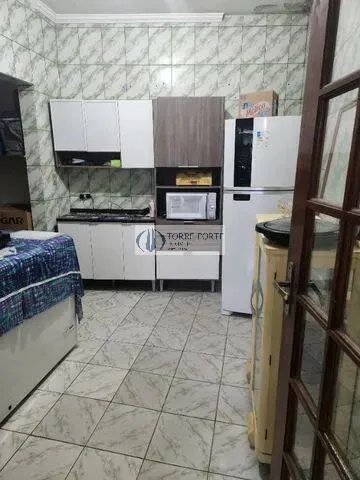 Imagem Casa com 2 suites 3 dormitorios 2 vagas na Aviação Praia Grande .