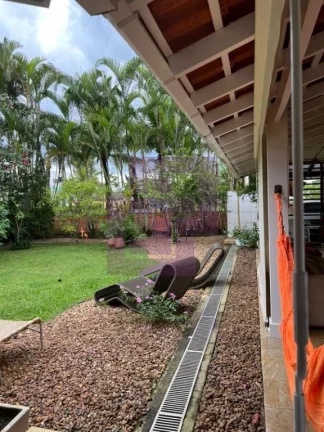 Imagem Casa à Venda no Condomínio Residencial Park Lane – 3 Suítes e Jardim com Árvores Frutíferas