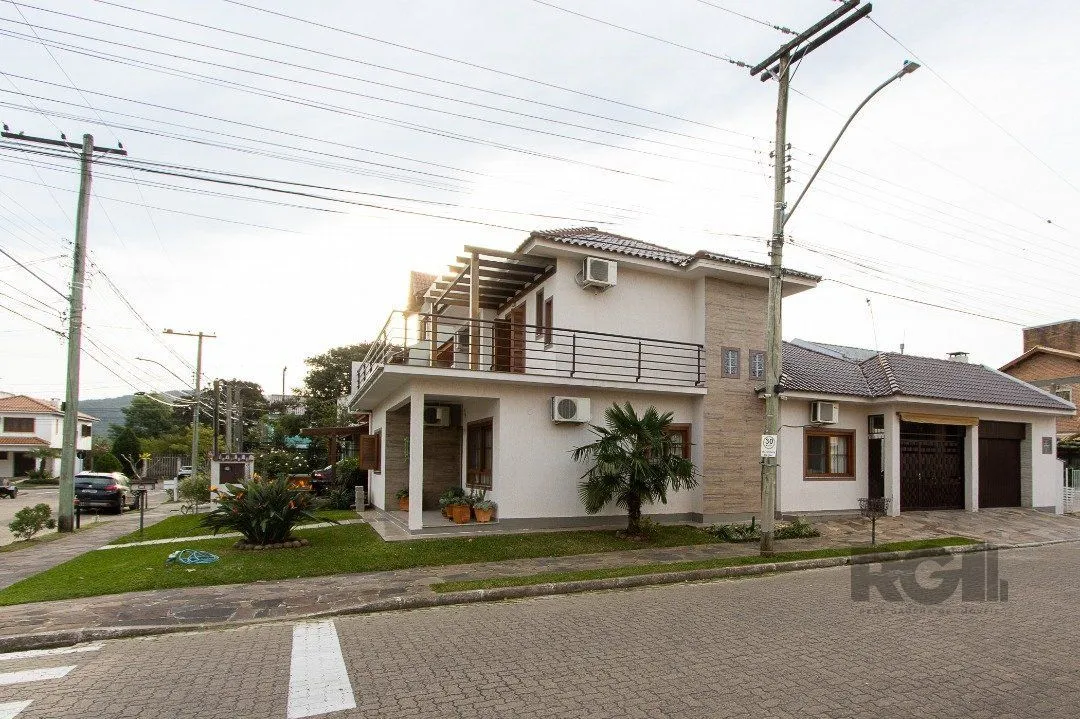 Imagem Casa para Venda com 3 dormitórios, sendo 1 suítes e 2 vagas no bairro Hípica