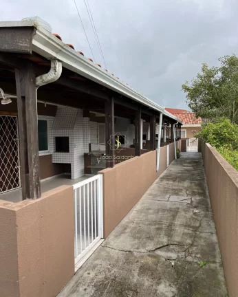 Foto do imóvel Casa em condomínio para venda em Guaratuba, 100m do mar em Rua Pato Branco