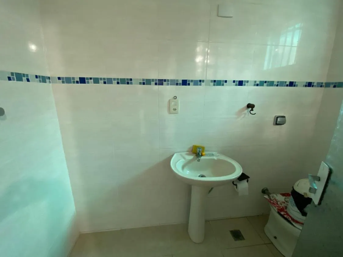 Imagem CASA DE ALTO PADRÃO COM 04 DORMITÓRIOS, PISCINA AQUECIDA E ACEITA FINANCIAMENTO BANCÁRIO LADO PRAIA EM ITANHAÉM