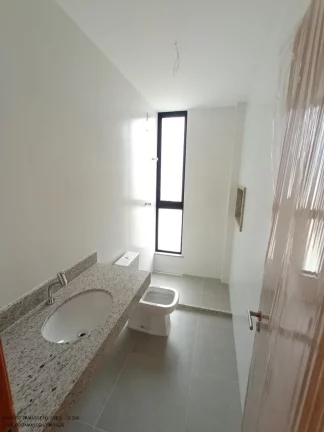 Imagem Luxuosa casa em condomínio à venda em Lauro de Freitas-BA, no bairro Buraquinho, com 4 quartos, 4 suítes, 2 salas, 1 banheiro, 2 vagas de garagem e 350m² de área.