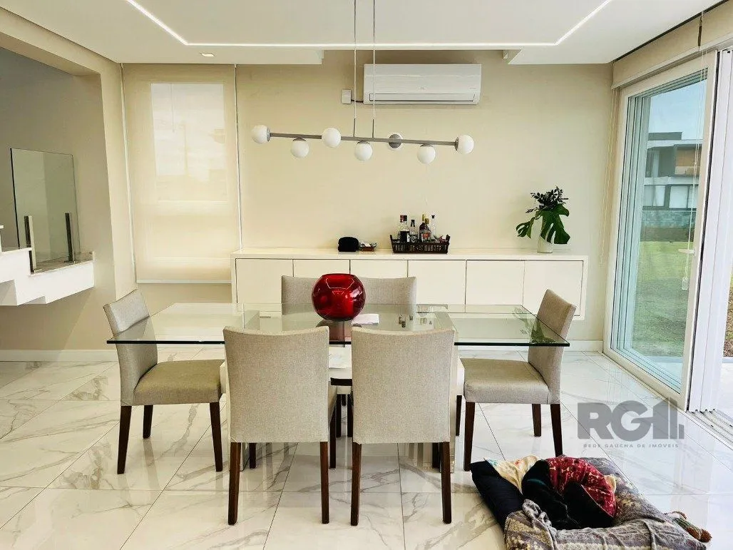 Imagem Casa para Comprar com 3 Suítes em Lote Molhado no Península Ponta da Figueira