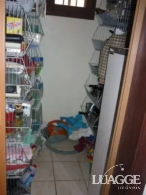 Imagem casa com 4 dormitórios, sendo uma suíte , e 530 area privativa