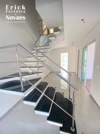 Imagem Casa a Venda na Praia do Morro-ES com 3 suítes sendo uma Suite master com Varanda, Sala de Estar e Jantar, quintal e Piscina e 2 vagas de garagem
