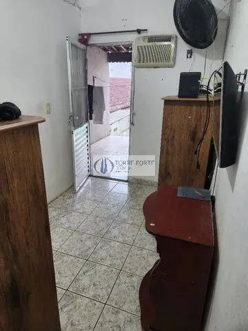 Imagem Casa com 2 suites 3 dormitorios 2 vagas na Aviação Praia Grande .