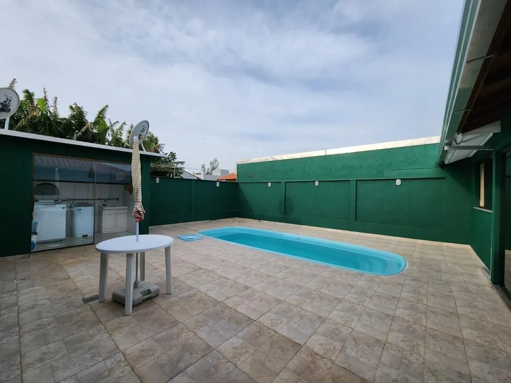 Imagem Casa 3 dormitórios, 1 suite, lareira, 2 vagas de garagem, piscina, bairro Mariápolis, Osório-RS