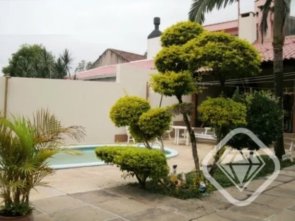 Imagem Casa individual com 4 dormitórios, sendo 1 suíte, e 3 vagas de garagem, no bairro Tristeza.

A Bri...