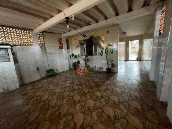 Foto do imóvel Casa com 2 dormitórios à venda por R$ 400.000 - Catiapoã - São Vicente/SP