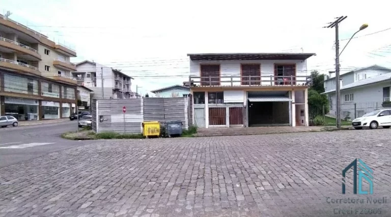 Imagem (PERMUTA) Imóvel comercial/residencial, próximo do centro, 05 quartos c/suíte em Flores da Cunha RS