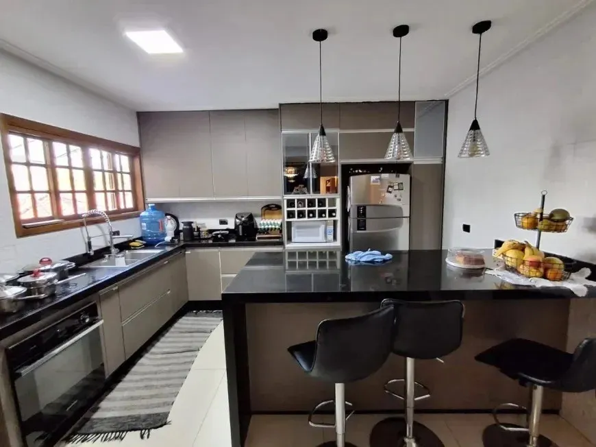 Imagem Casa para Venda em São Paulo, Parque Ipê, 3 dormitórios, 1 suíte, 2 banheiros, 2 vagas