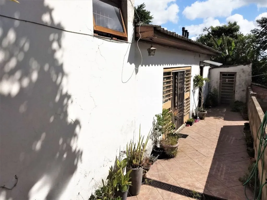 Imagem Casa 4 dormitórios à venda no Bairro Vila Jardim - Porto Alegre