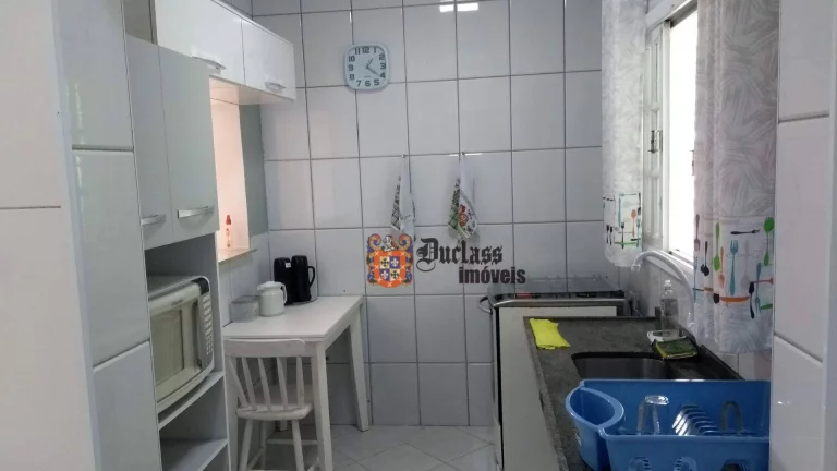 Imagem Sobrado com 2 dormitórios à venda, 180 m² por R$ 590.000,00 - Balneario Praia do Perequê - Guarujá/SP