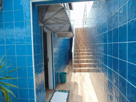 Foto do imóvel Casa com 3 dormitórios à venda, 142 m² por R$ 700.000,00 - Maracanã - Praia Grande/SP