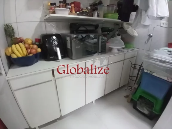 Imagem Casa em Vila à venda com 2 quartos, 2 banheiros, churrasqueira na Vila Mathias em Santos por R$426.000,00