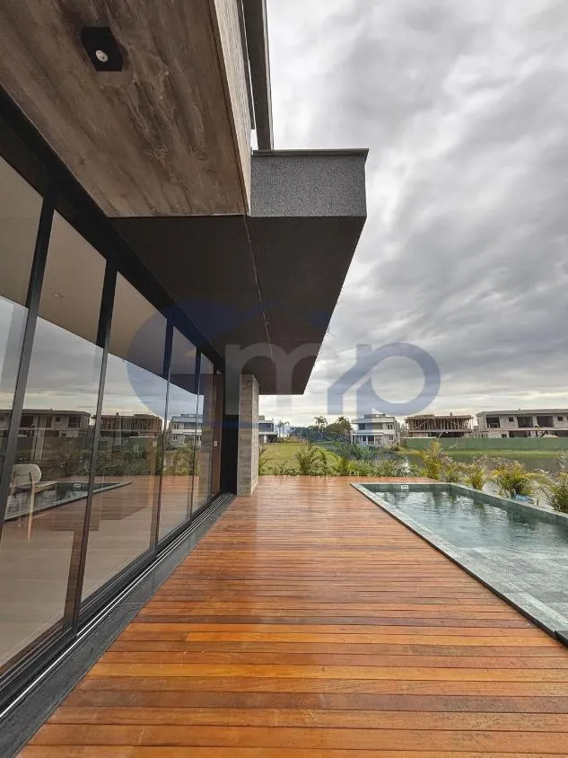 Imagem Casa de 4 suites com piscina a venda no Condominio Ilhas Park, Guarita, Torres/RS