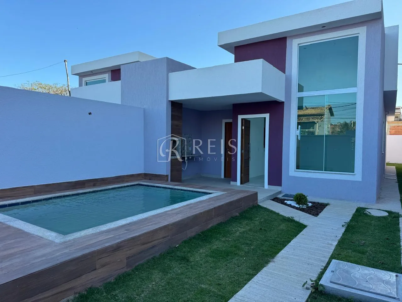 Imagem Casa para Venda em Rio das Ostras, Village Rio das Ostras, 3 dormitórios, 1 suíte, 2 banheiros, 2 vagas