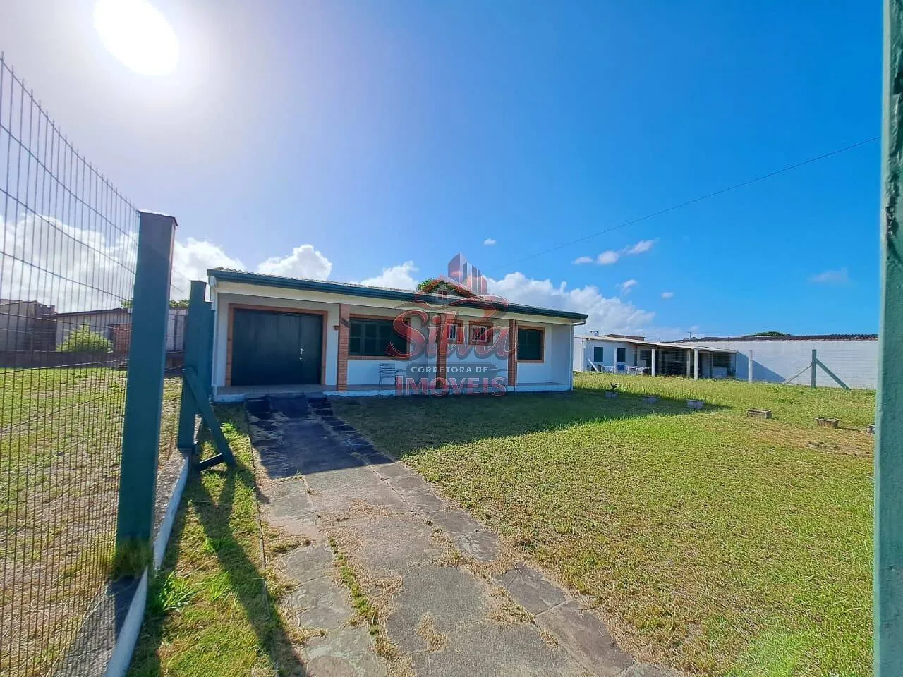Imagem C487| Casa à venda em Imbé RS com 3 dormitórios, suíte e pátio cercado