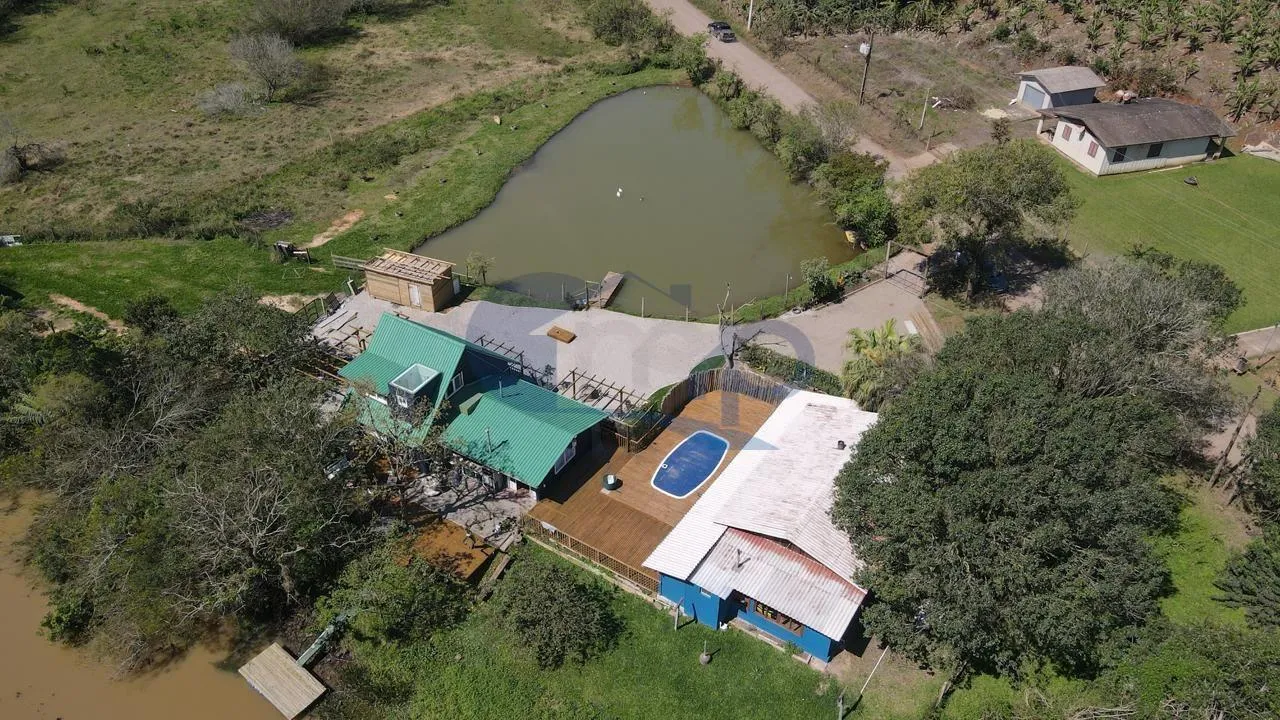 Imagem Sitio com chale e casa de alvenaria em Vila Sao Joao, Torres