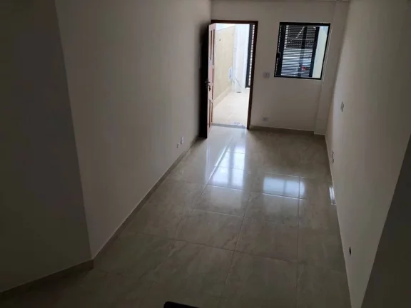 Imagem Sobrado com 2 dormitórios à venda, 60 m² por R$ 390.000,00 - Caiçara - Praia Grande/SP