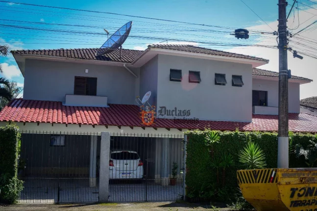 Foto do imóvel Apartamento com 3 dormitórios à venda, 113 m² por R$ 590.000 - Toninhas - Ubatuba/SP
