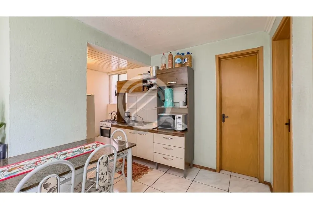 Imagem Descubra o seu novo lar no bairro Partenon. Este apartamento residencial à venda apresenta uma opor...