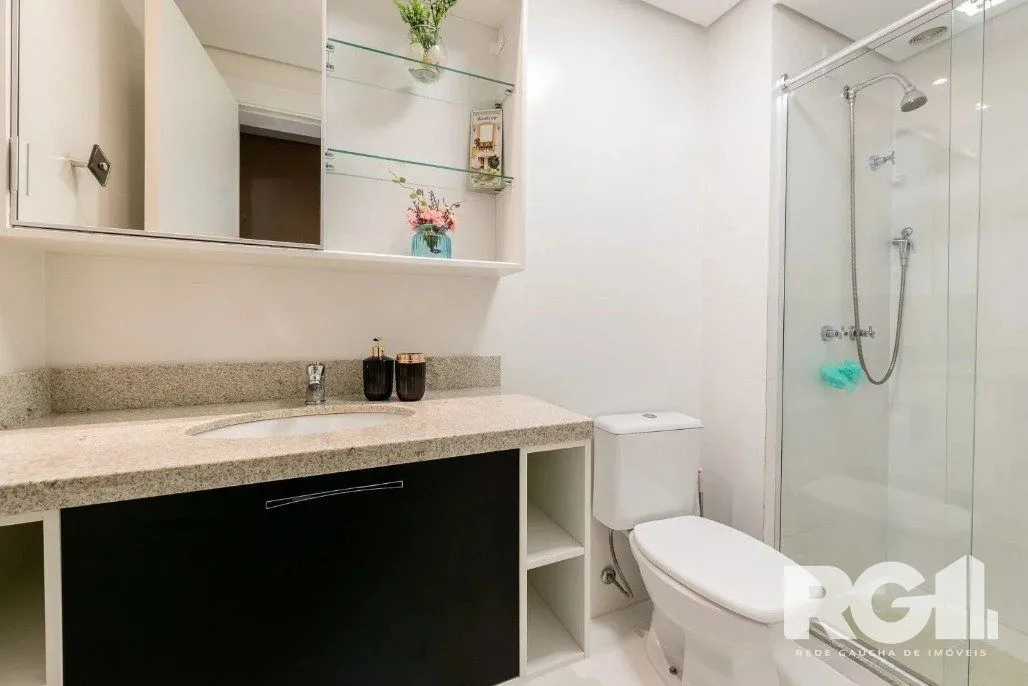 Imagem Apartamento de 3 dormitórios com suíte e churrasqueira, lavabo e 2 vagas de garagem.